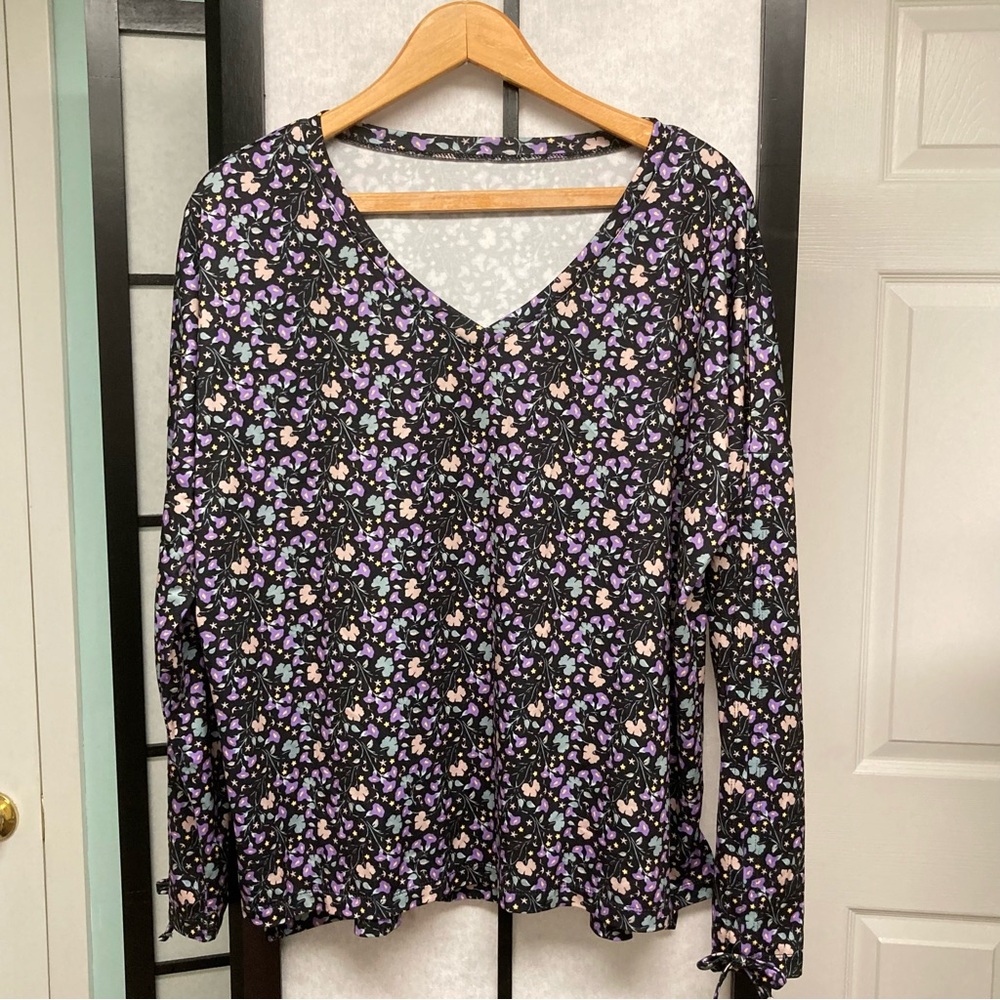 NWOT Plus size top (see measurements). Tags removed. Poly. Open sleeves.